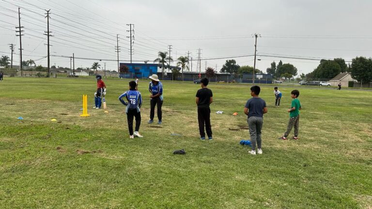 Youth cricket players on pitch at Hope School in Buena Park